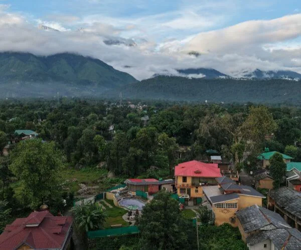 An eco-friendly mud house villa near Dharamshala & Palampur, thoughtfully designed for sustainable living, natural comfort, and peaceful mountain stays in Himachal Pradesh.